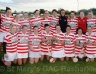 Shaws Road side St.Pauls celebrate after clinching the Junior Camogie Championship at Creggan